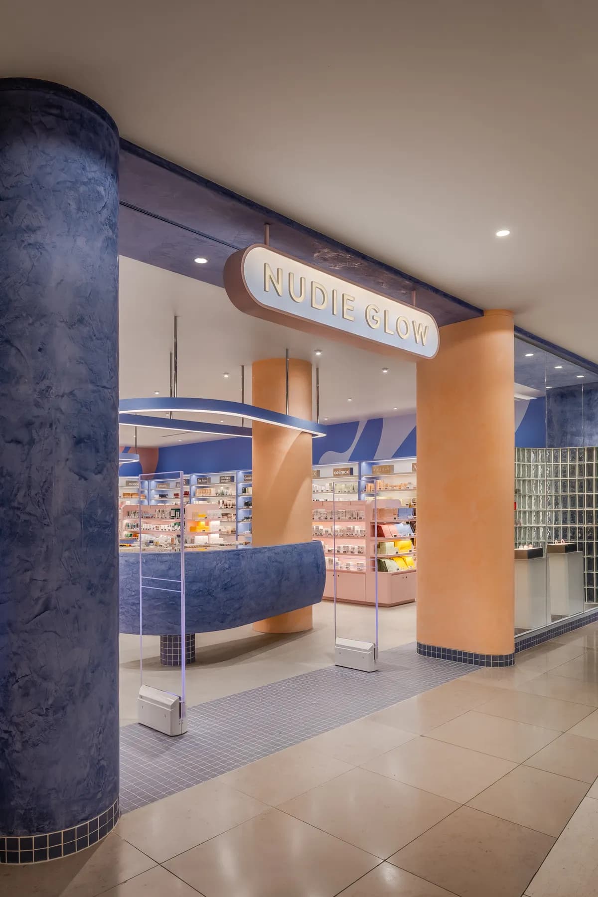 Nudie Glow retail fitout with custom display joinery